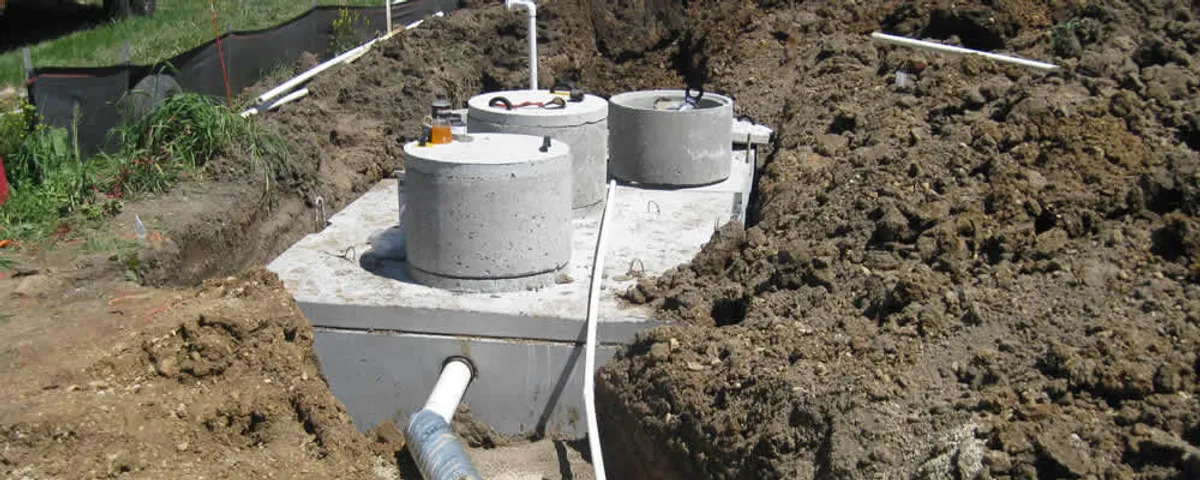 Septic system repair and installation site with tank access ports in Los Angeles, CA